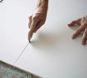 how to remove tile backsplash and replace drywall if needed, person using utility knife to cut drywall