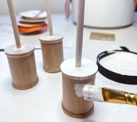 There are lots of fun ways to decorate for spring, but this wooden spool idea might be one of our new favorites