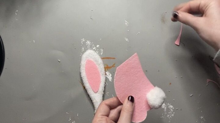 Photo of Megan adding the pink felt to the cloth cutout