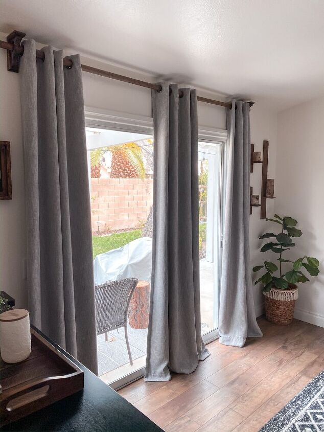 best blackout curtains, gray blackout curtains on sliding glass door Photo via Jessie