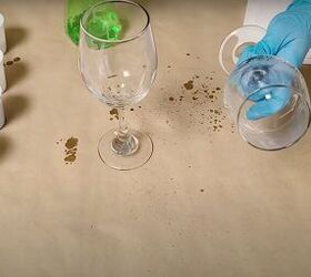 9 easy steps to gorgeous geode resin wine glasses, Spraying the wine glasses with isopropyl alcohol to remove dirt and oil