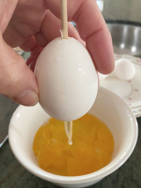 how to make decoupage easter eggs, Break up the interior membrane