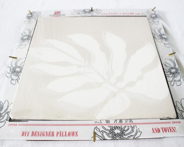 diy stencil pillow cover of tropical leaf