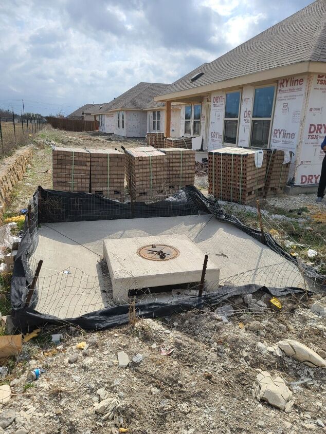 large storm drain in backyard