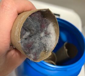 She stuffs laundry lint into empty paper towel rolls for a handy hack that's easy and free