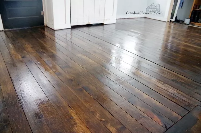 best hardwood floor cleaners, shiny dark hardwood floors photo via GrandmasHouseDIY