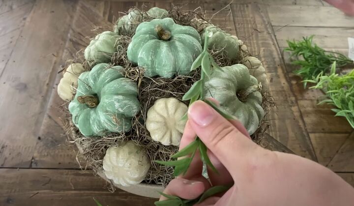 this diy pumpkin topiary is the perfect addition to your fall dcor, Adding herb picks to the topiary