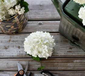 create a table centerpiece using spring blooms from the garden