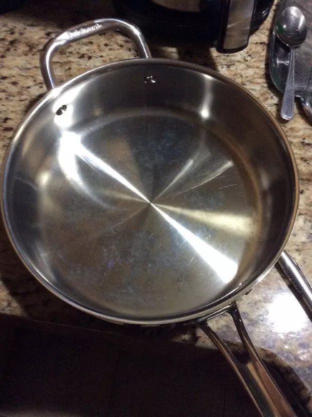how to clean stainless steel pans properly, discolored stainless steel pan
