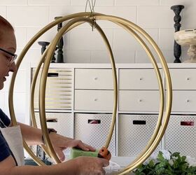 how to make a gorgeous outdoor hula hoop chandelier, Placing foam in the middle of the chandelier