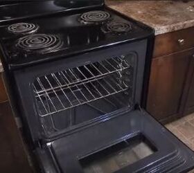 how to replace an oven heating element and when to do it, clean oven with open door and black stovetop