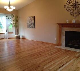 how to restore hardwood floors without sanding yes it s possible, living room with refinished hardwood floors and fireplace