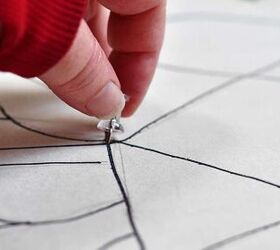 Poke holes in a canvas with a thumbtack to copy this ridiculously pretty wall accent