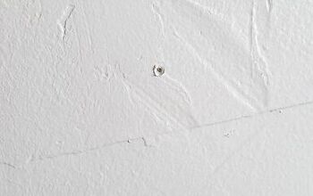 Cómo rellenar agujeros de clavos en la pared