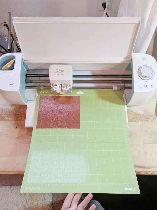 how to clean a cricut mat and get it sticky again, green cutting mat in cricut machine