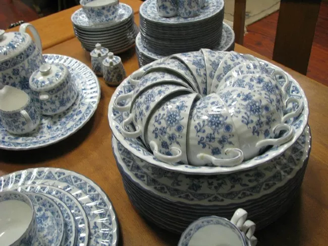 how to store china, blue and white china sitting on table