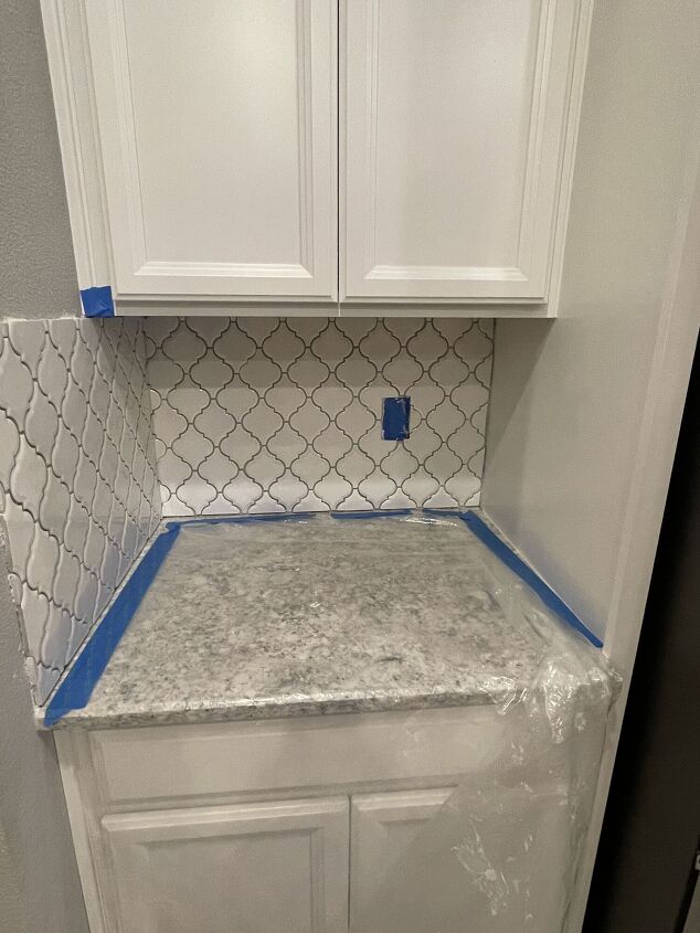 instalar un panel de azulejos en la cocina