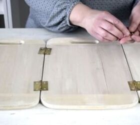 She screws 3 cutting boards together for a brilliant way to solve a very common kitchen problem