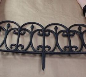 She ties together 2 Dollar Tree garden fences for the coolest summer porch idea