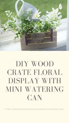 diy wood crate floral display with mini watering can