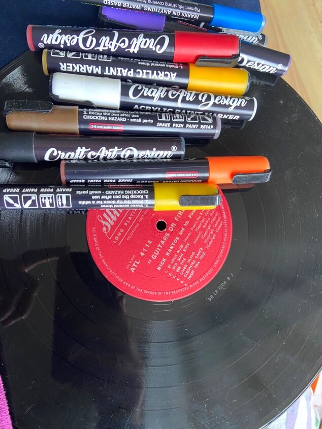 up cycle a vinyl record into mindful mandala art, Paint pens and vinyl record