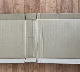 She turns leftover cardboard boxes into the most amazing front door idea (for a total of $16!)