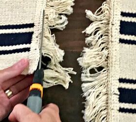 Cut the edges off of 2 rugs to get this high-end look on a tiny budget