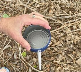 She glues an empty tuna can to a spare broom handle for the coolest outdoor idea