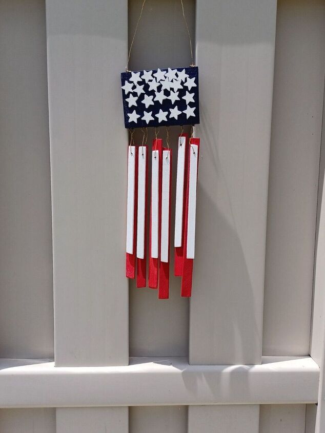 how to create decorative flag decor from scrap wood, Hanging from my courtyard gate