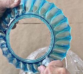 She cuts the bottoms out of plastic dollar store bowls for this gorgeous porch idea