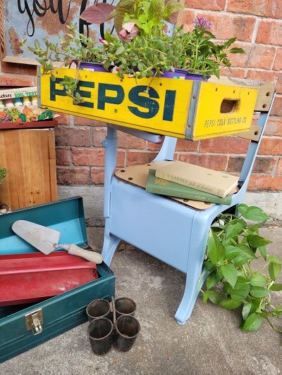 a vintage school desk easily repurposed for your plants
