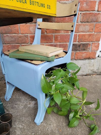 a vintage school desk easily repurposed for your plants