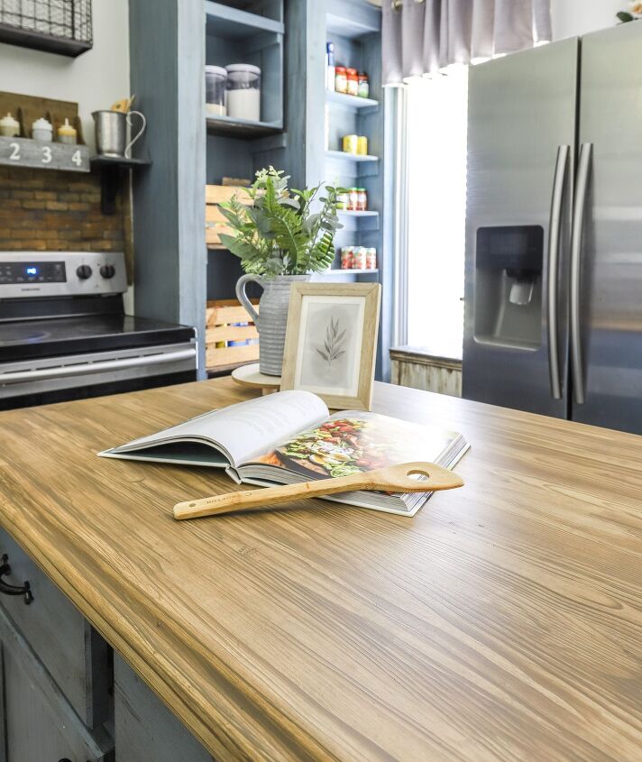 raise your home s value with these 10 diy ideas, Paint Laminate Countertops To Look Like Wood