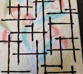 She draws lines of hot glue on an unwanted canvas to create this wild wall accent