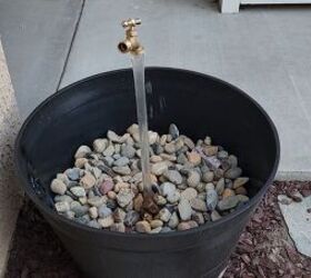 mesmerize your guests with this fancy floating fountain diy, Floating fountain on front porch