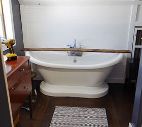 She brought in this wooden plank to give her bathroom such a clever storage solution