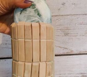 She glued clothespins to a glass bottle and the result left us completely floored