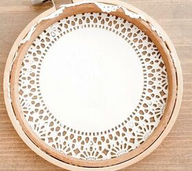 Press a paper doily into an embroidery hoop to copy this easy & delicate look