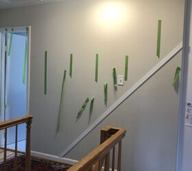 She sticks pieces of tape to her wall for a makeover that's much more fun than paint