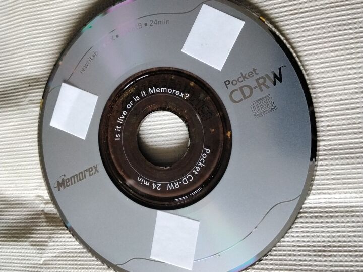 arte de tcnica mixta cds de bolsillo convertidos en girasoles, Tiras de cinta adhesiva de dos v as