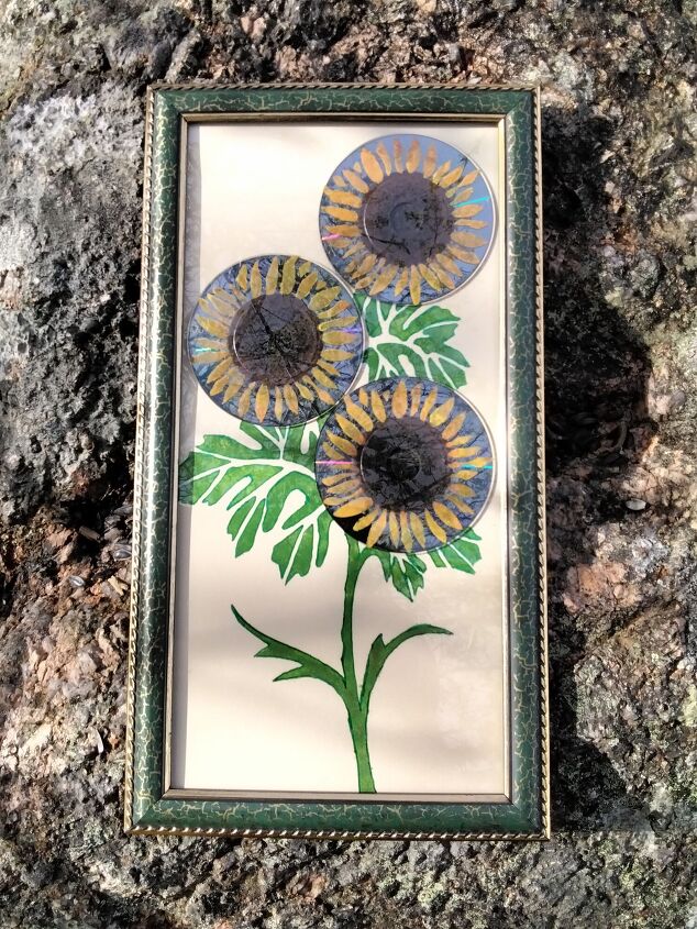 mixed media art pocket c d s repurposed into sunflowers, Sunlight reflections