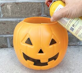 She sprays cooking oil in a pumpkin bucket for an outdoor update that everyone should try this fall