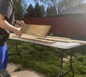 We kinda can't get over how a bunch of pallet wood completely upgraded this boring plastic folding table