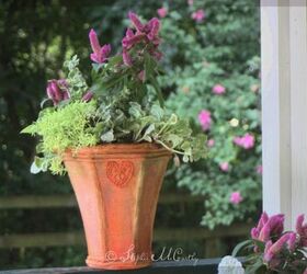 use lamp shades to create flower pots