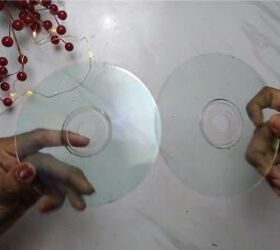 Scrape the top layer off old CD's to make this wild outdoor accent