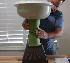 how to turn plastic planters into a beautiful diy urn planter, Connect the two sides of the urn by gluing the pillar pots together