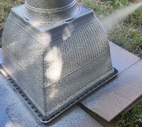 how to turn plastic planters into a beautiful diy urn planter, Spray the DIY urn planter with stone paint