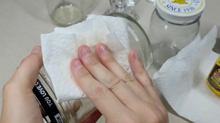 from trash to treasure how to make diy apothecary jars, Wipe off any residue from the jars