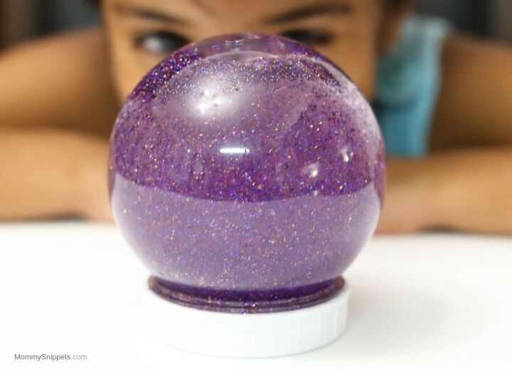 un mundo nuevo con el globo de purpurina de aladino