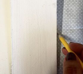 She covered some scrapwood in patterned fabric for this adorably useful idea